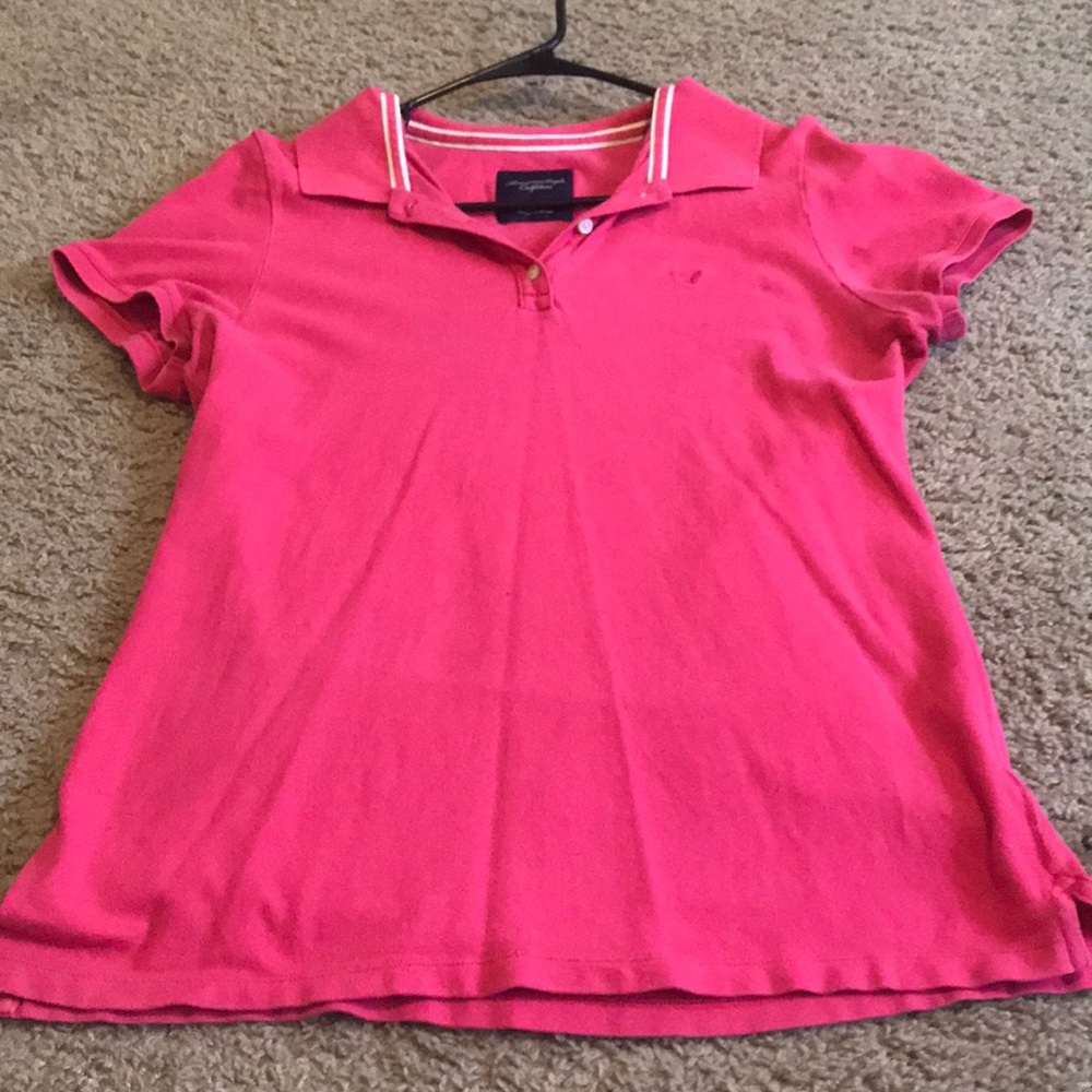 A pink short sleeve shirt